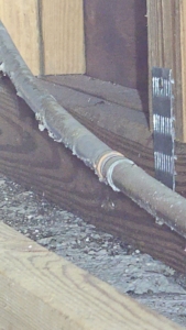 Polybutylene pipe displaying the PB2110 marking